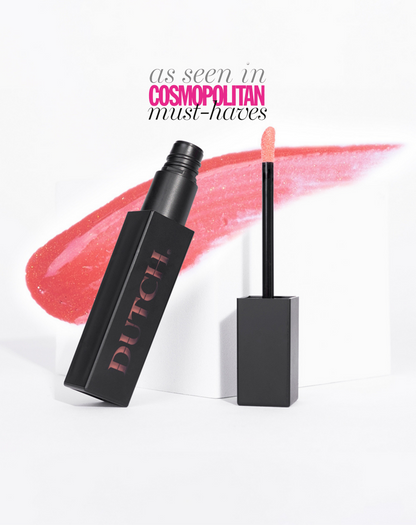 Cosmopolitan must have lipgloss 2023 vegan niet plakkerig roze met glitter swatch.